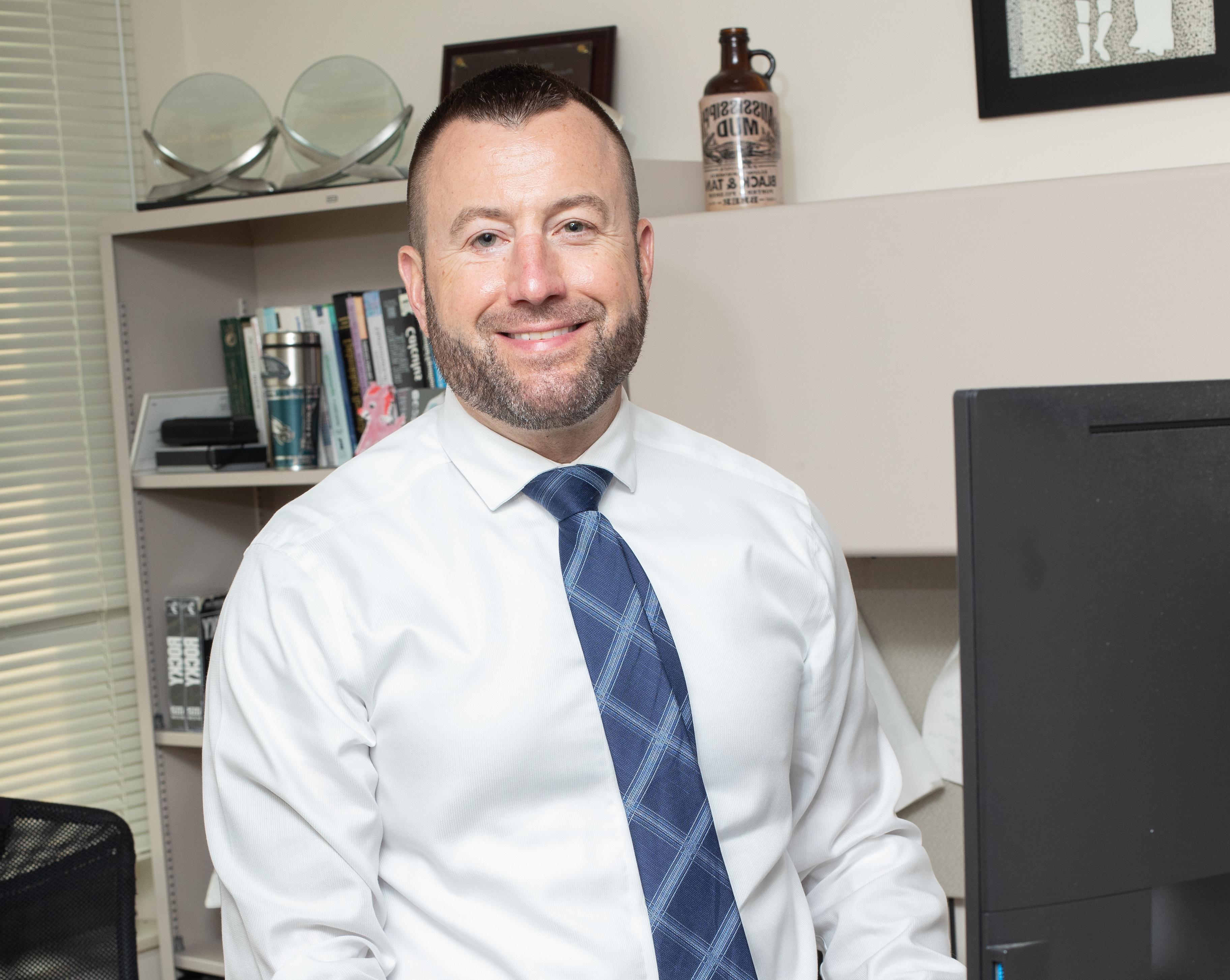 Dr. Thomas P. Lodise in his office